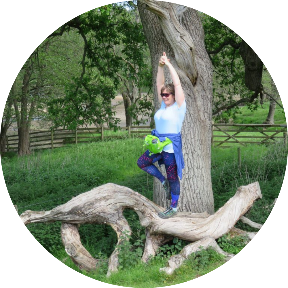 Image of Phillipa Wilson in Tree Pose on a tree branch